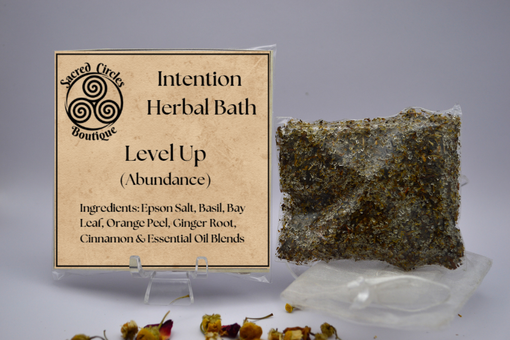 Herbal bath product with packaging labeled 'Level Up (Abundance)' from Sacred Circle Boutique.